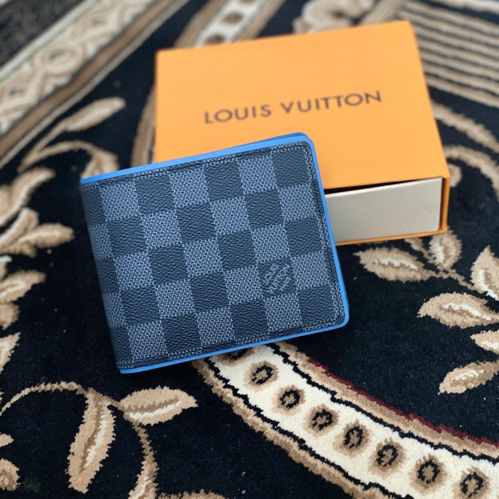 NeW Louis Vuitton blue lining wallet.